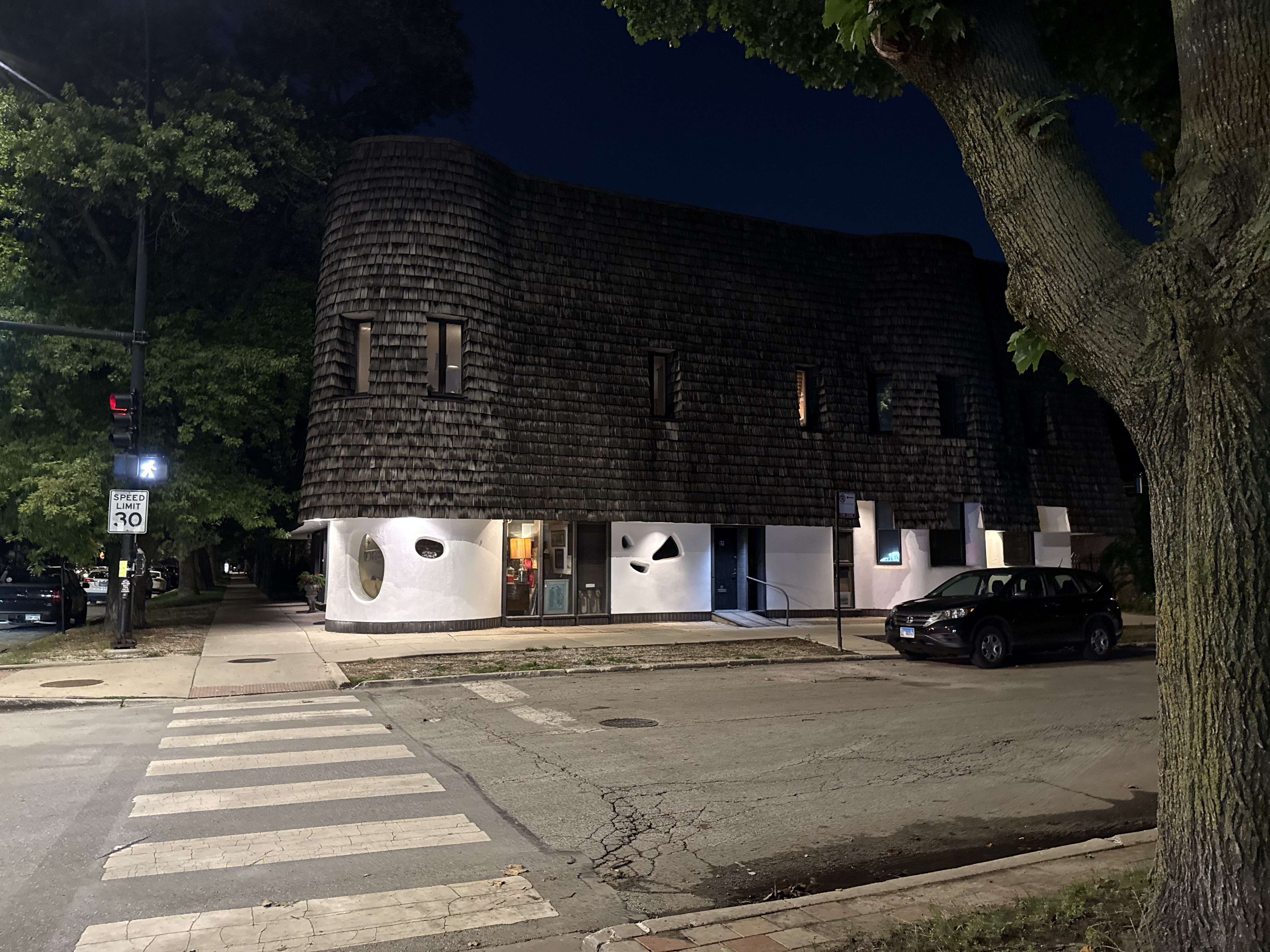 A night exterior shot of 1900 W Addison, taken from the side closest to the addison brown line.
